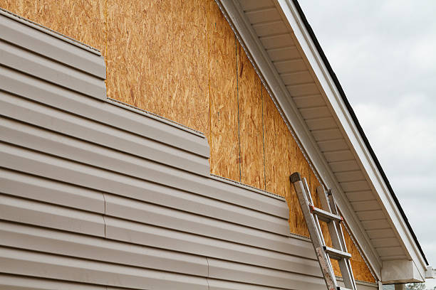 Professional Storm Damage Siding Repair technician working in Oxford, NC